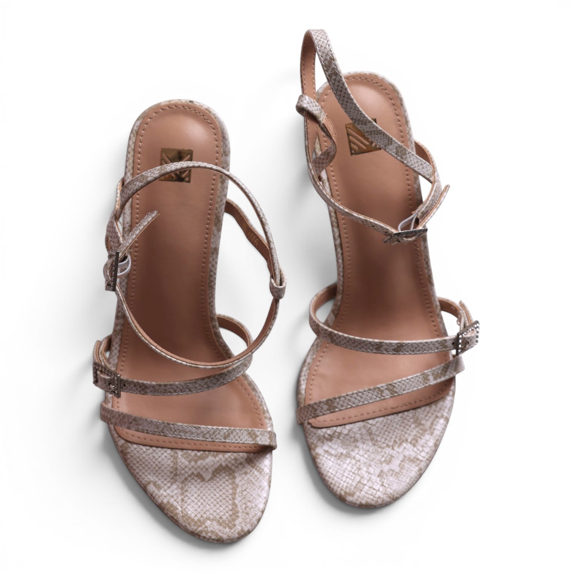 Moda Ug women's beige snake print stiletto sandals with thin straps and buckle closure.