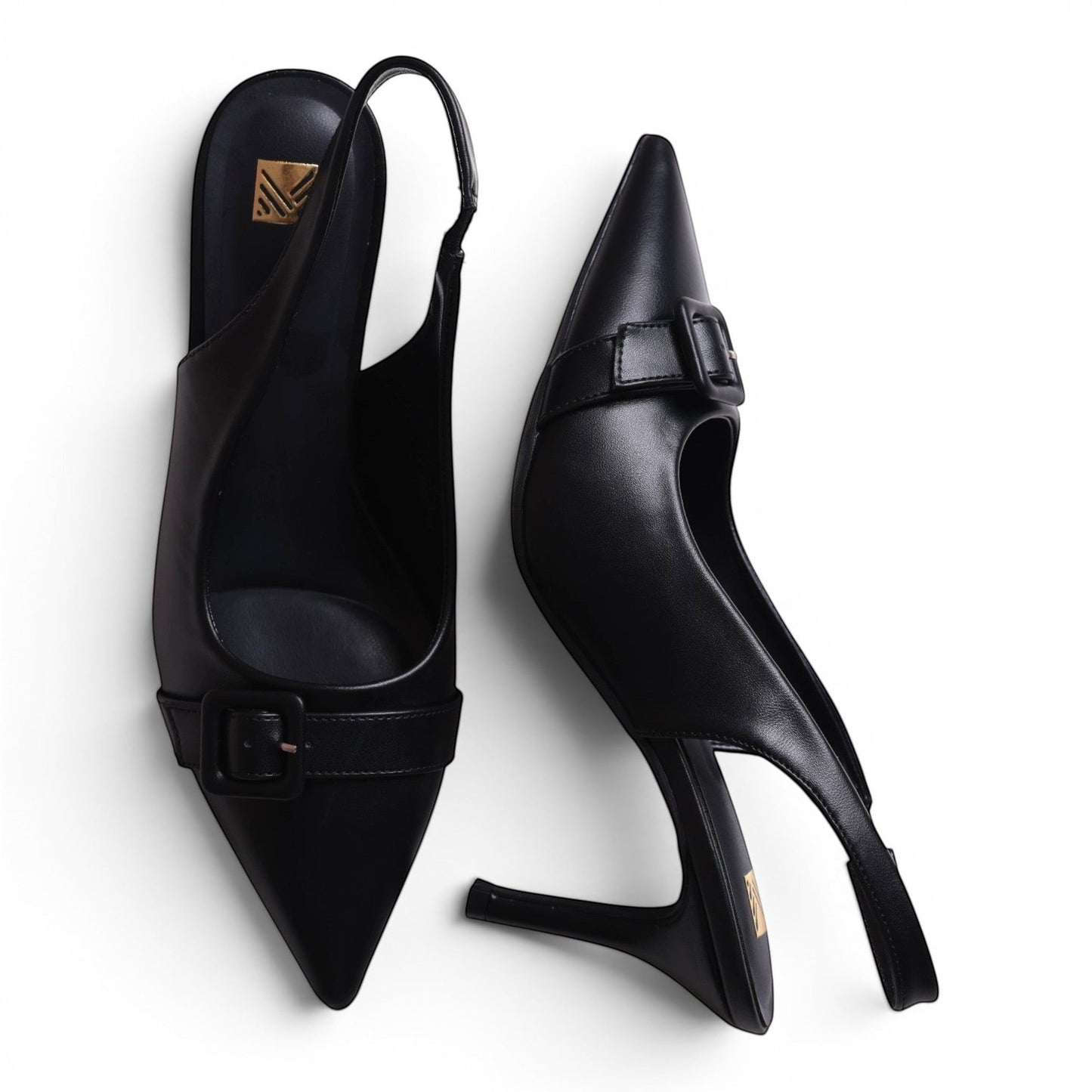 Moda Ug black leather pointed-toe slingback heels with buckle detail and stiletto heel.