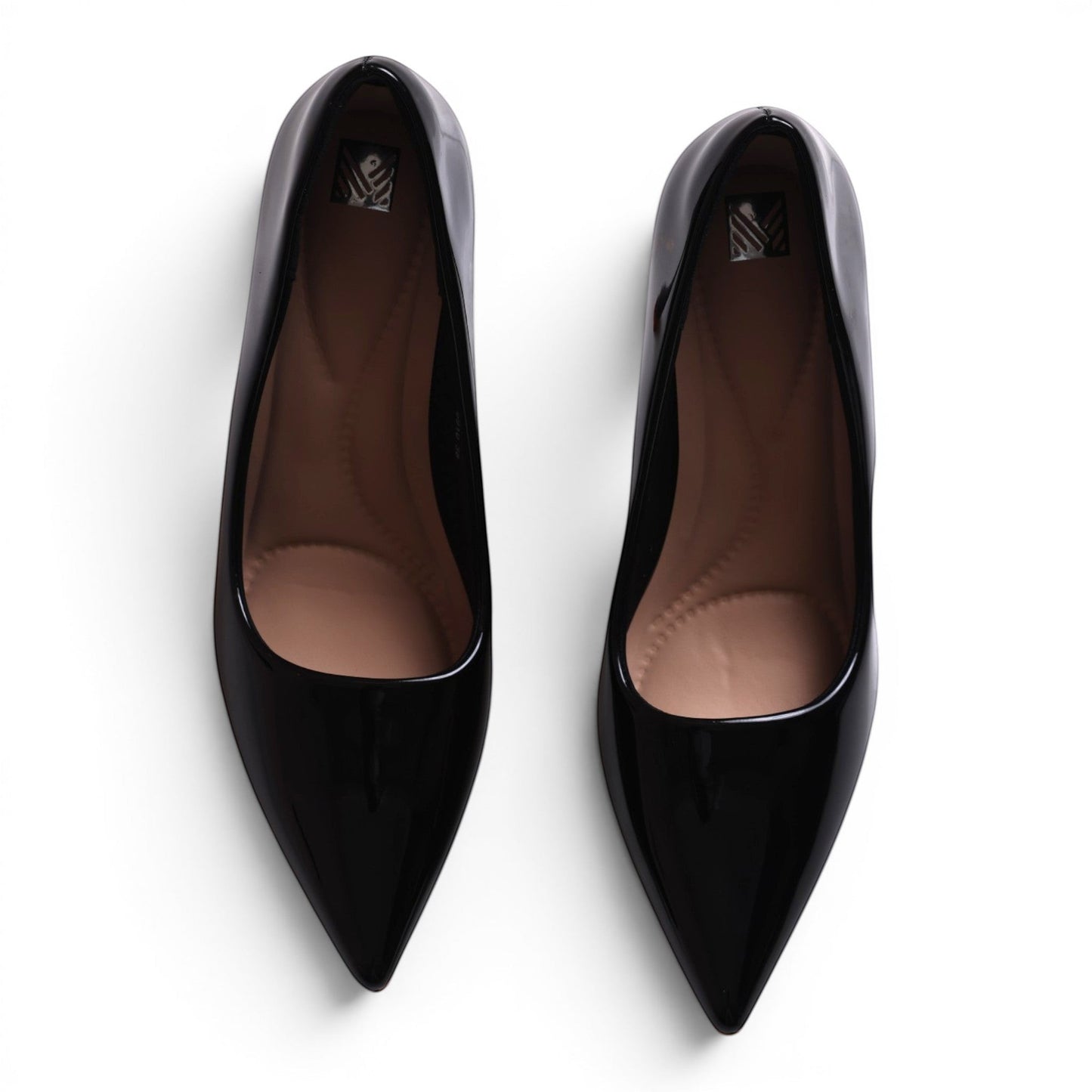 Moda Ug black patent leather pointed-toe ballet flats with cushioned insoles.