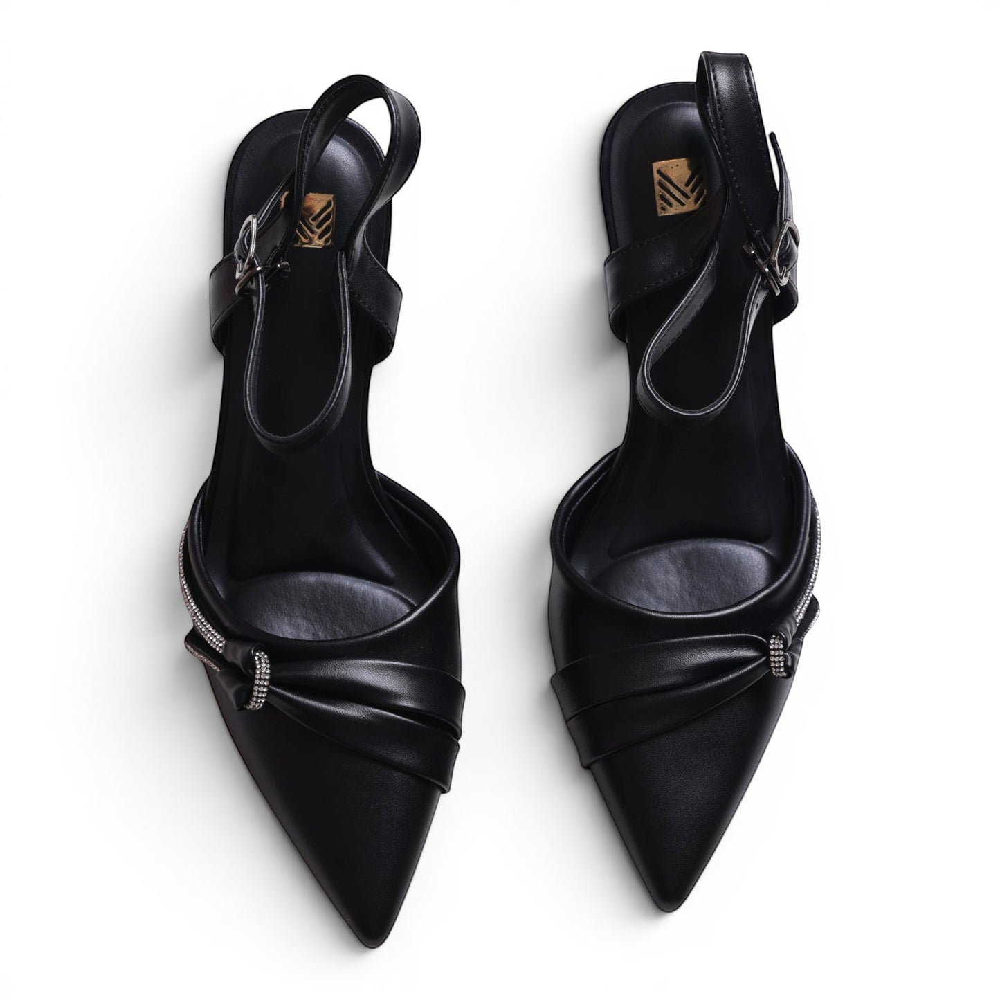 Moda Ug Women's black faux leather pointed toe heels with ankle strap and rhinestone embellishment.