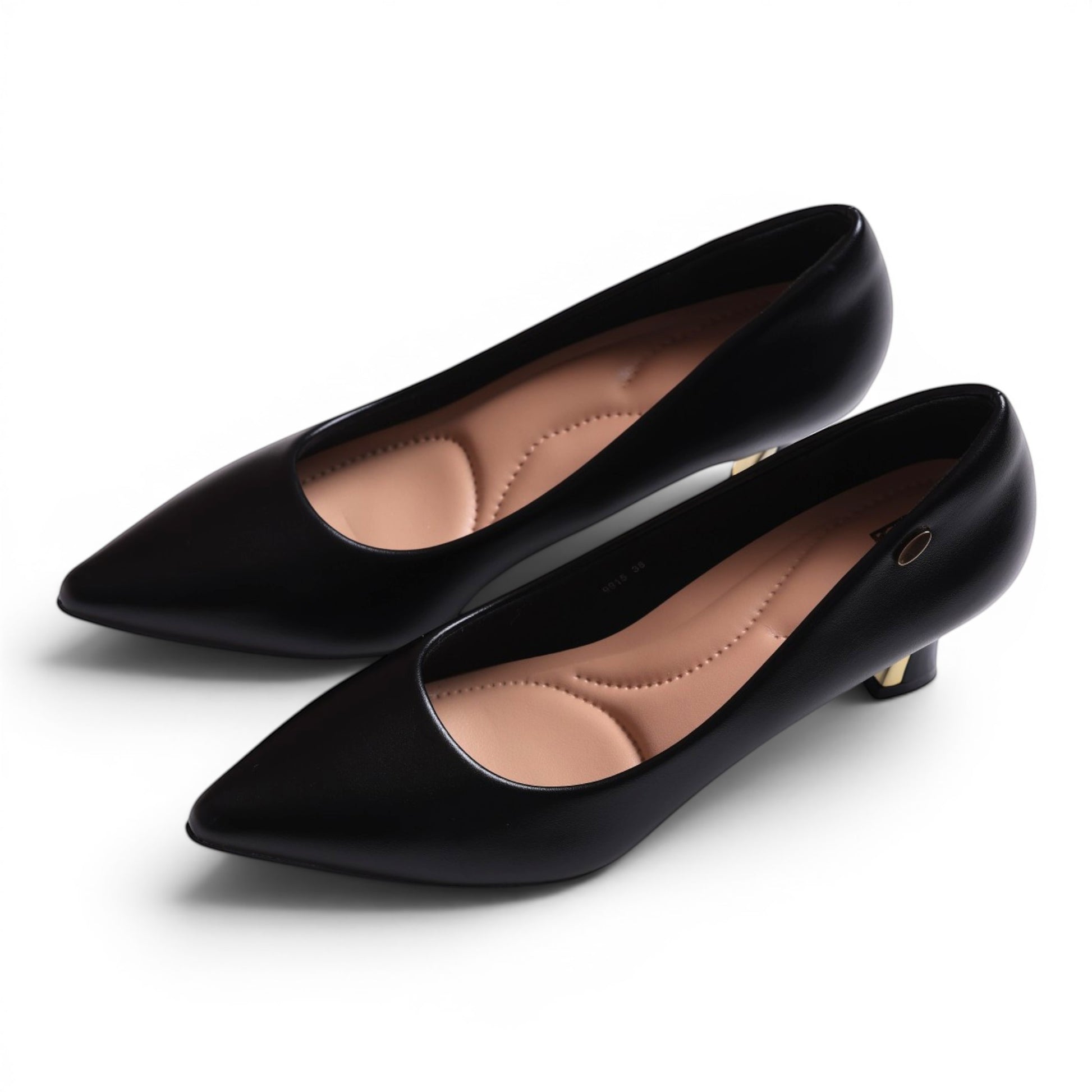 Moda Ug black faux leather pointed-toe pumps with cushioned insoles and gold accent heel.