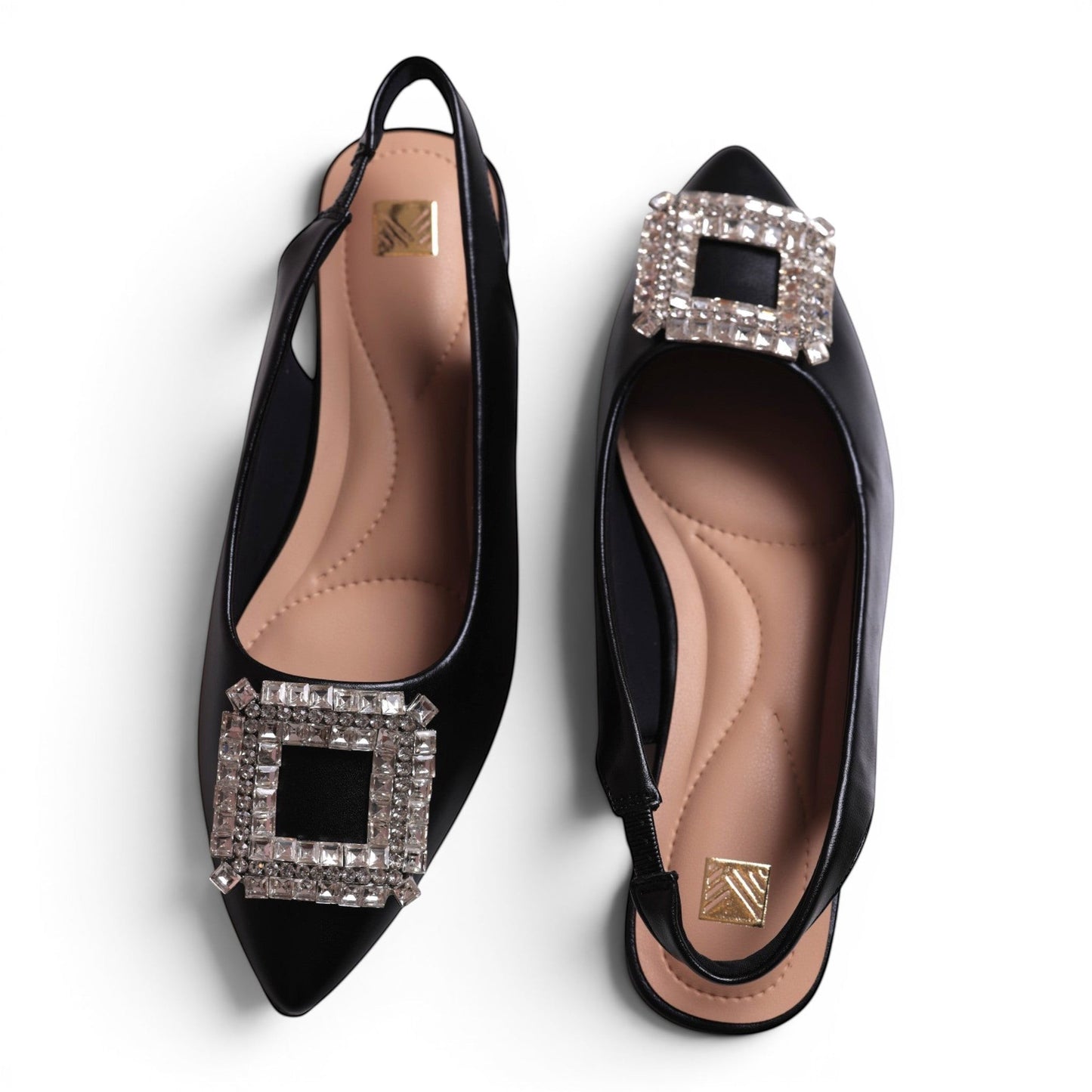 Moda Ug black pointed toe slingback flats with square crystal embellishments and cushioned insoles.