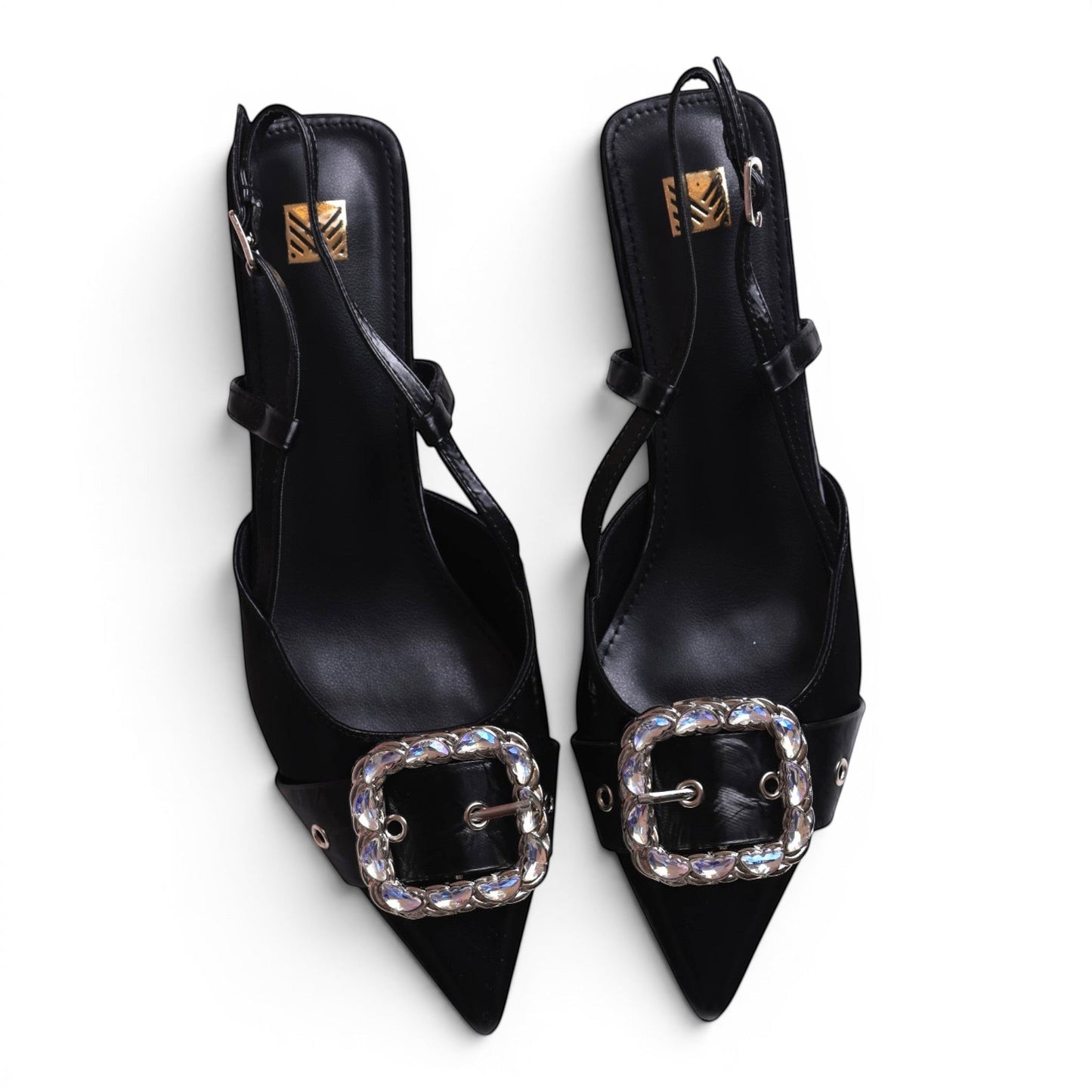 Moda Ug black pointed-toe slingback heels with crystal-embellished buckles and adjustable ankle straps.