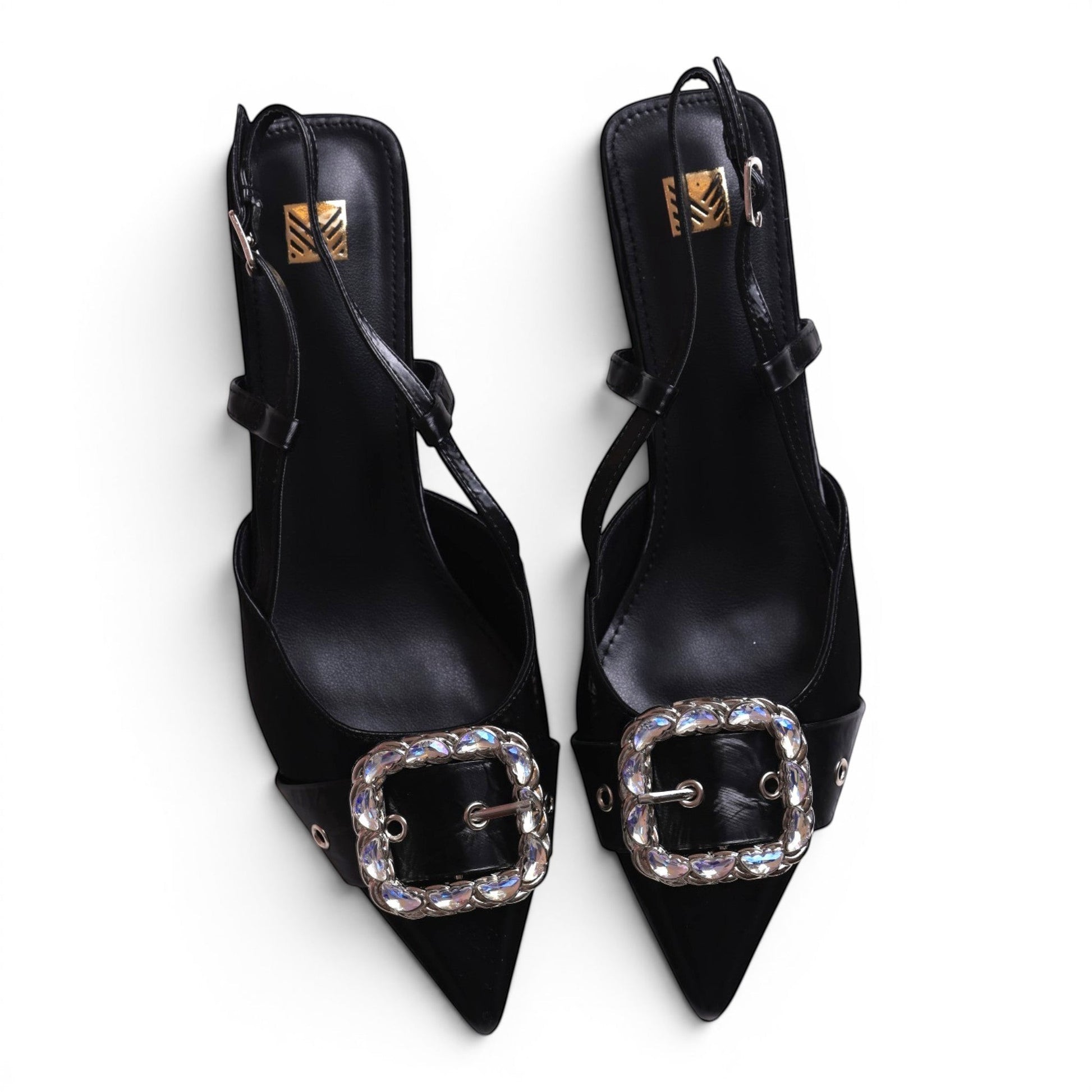 Moda Ug black pointed-toe slingback heels with crystal-embellished buckles and adjustable ankle straps.