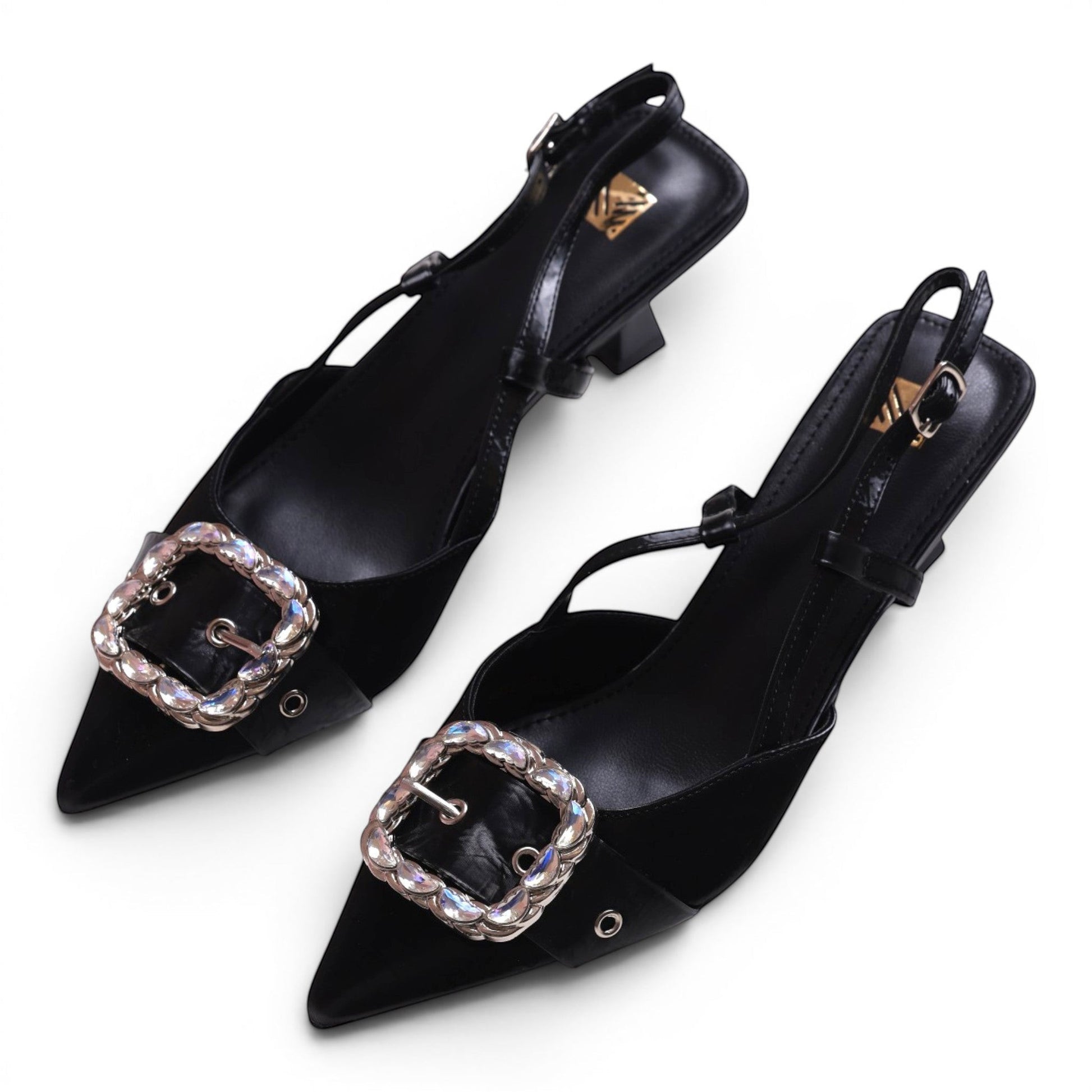 Moda Ug black slingback heels with pointed toe and decorative crystal buckle.