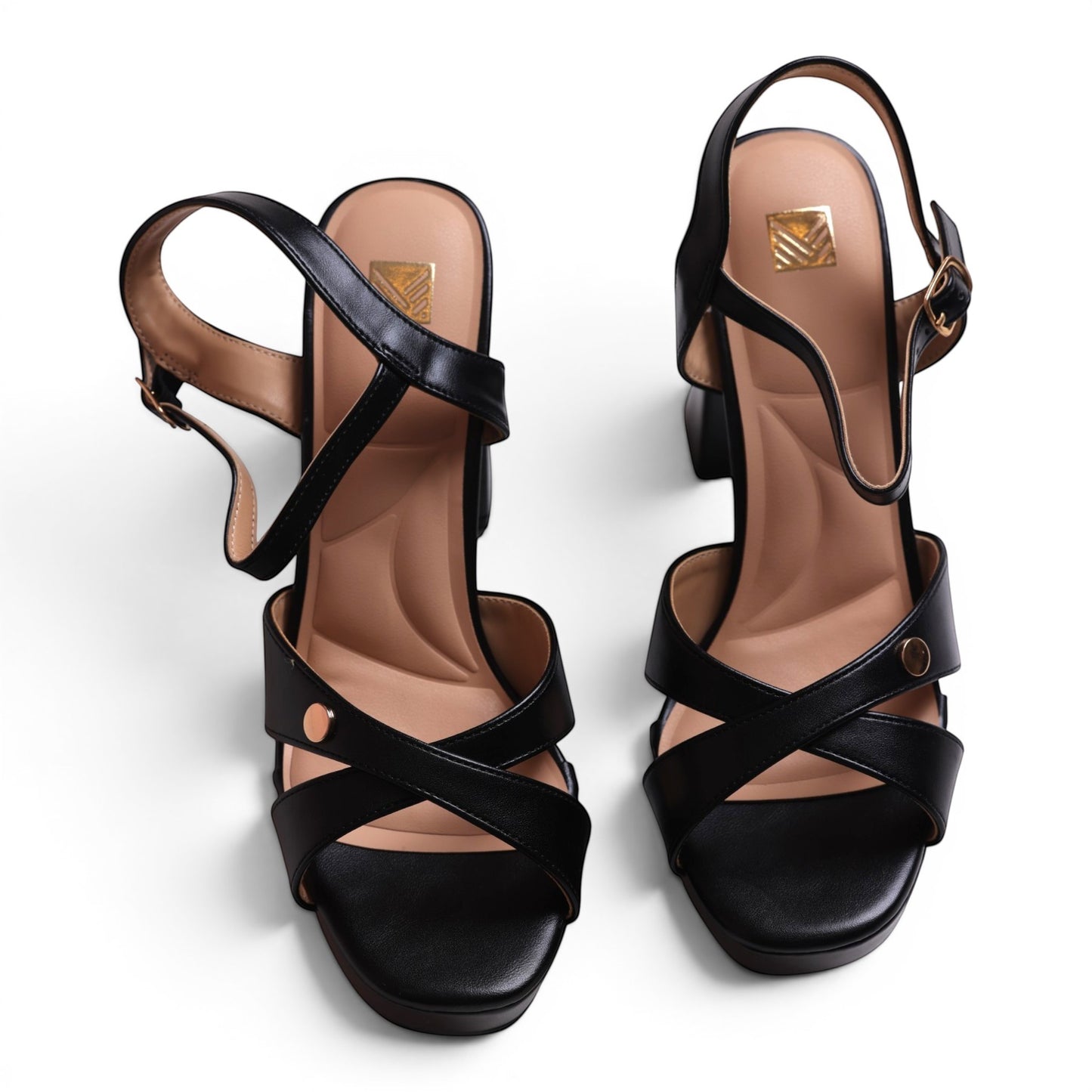 Moda Ug black faux leather criss-cross strap block heel sandals with ankle strap and buckle closure.