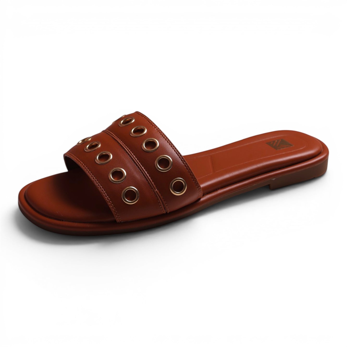 Moda Ug brown leather slide sandals with gold grommet details and a square toe.