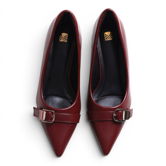 Moda Ug burgundy leather pointed-toe pumps with buckle detail and dark insole.