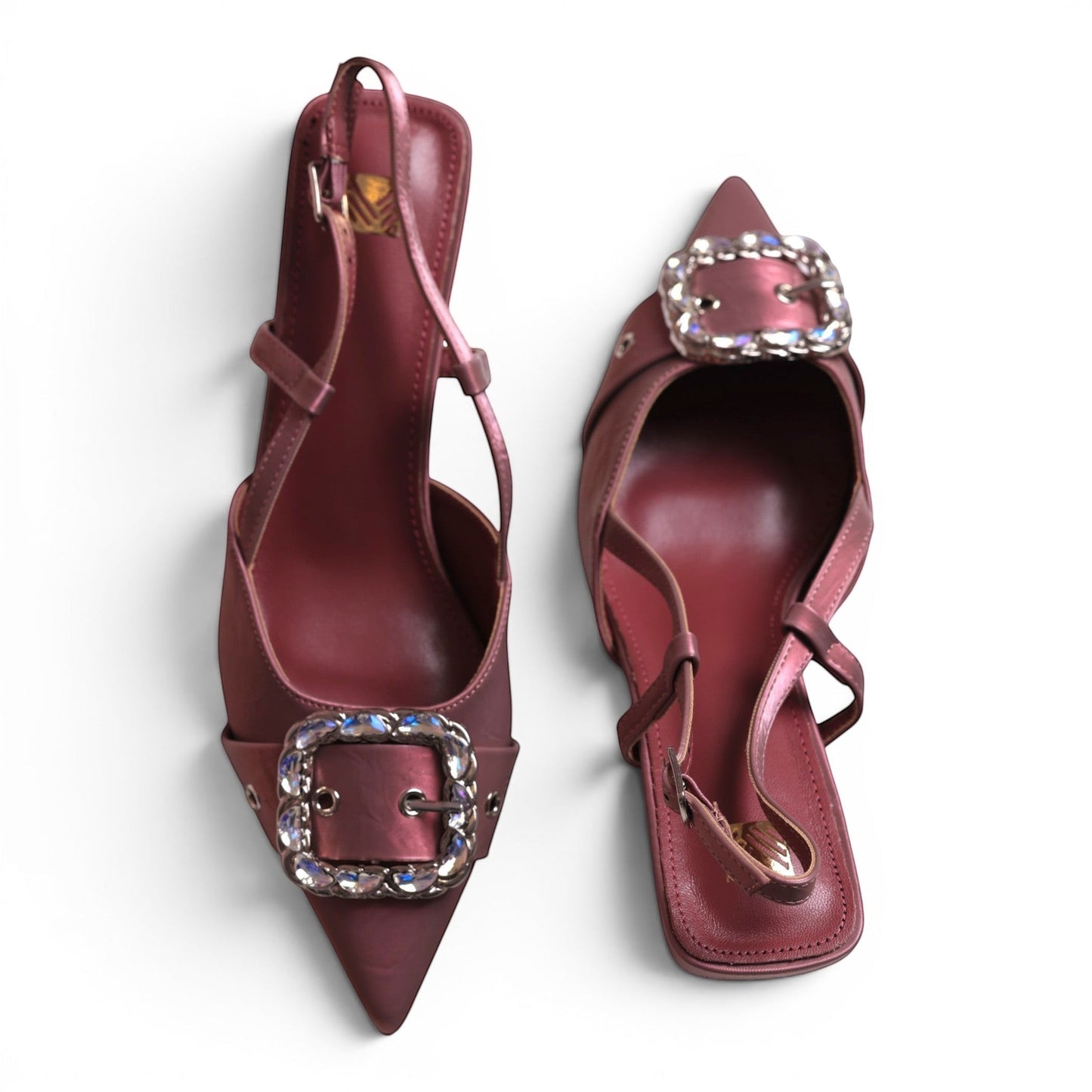 Moda Ug women's burgundy slingback heels with pointed toe and decorative crystal buckle.