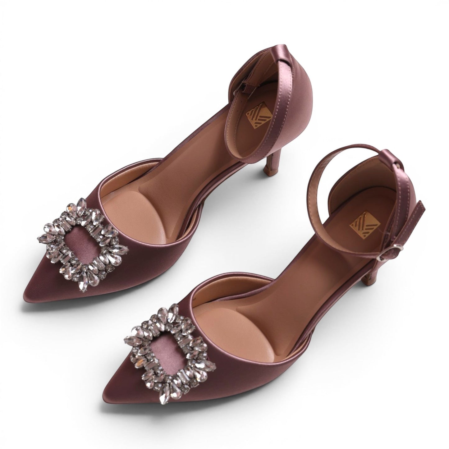Moda Ug women's dusty rose satin pointed-toe kitten heels with ankle strap and crystal buckle detail.