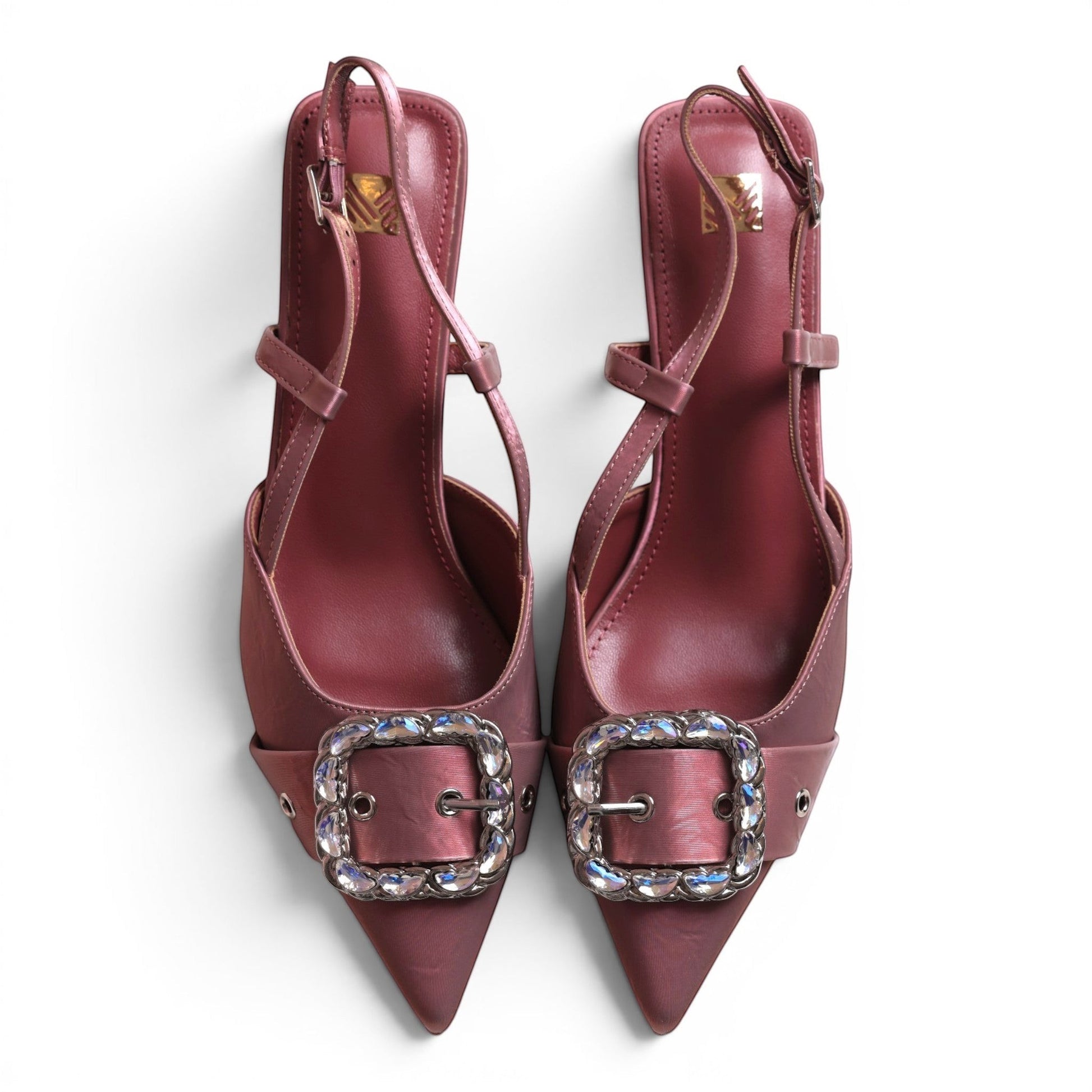 Moda Ug women's pointed-toe slingback heels in dusty rose with crystal-embellished buckles and adjustable ankle straps.