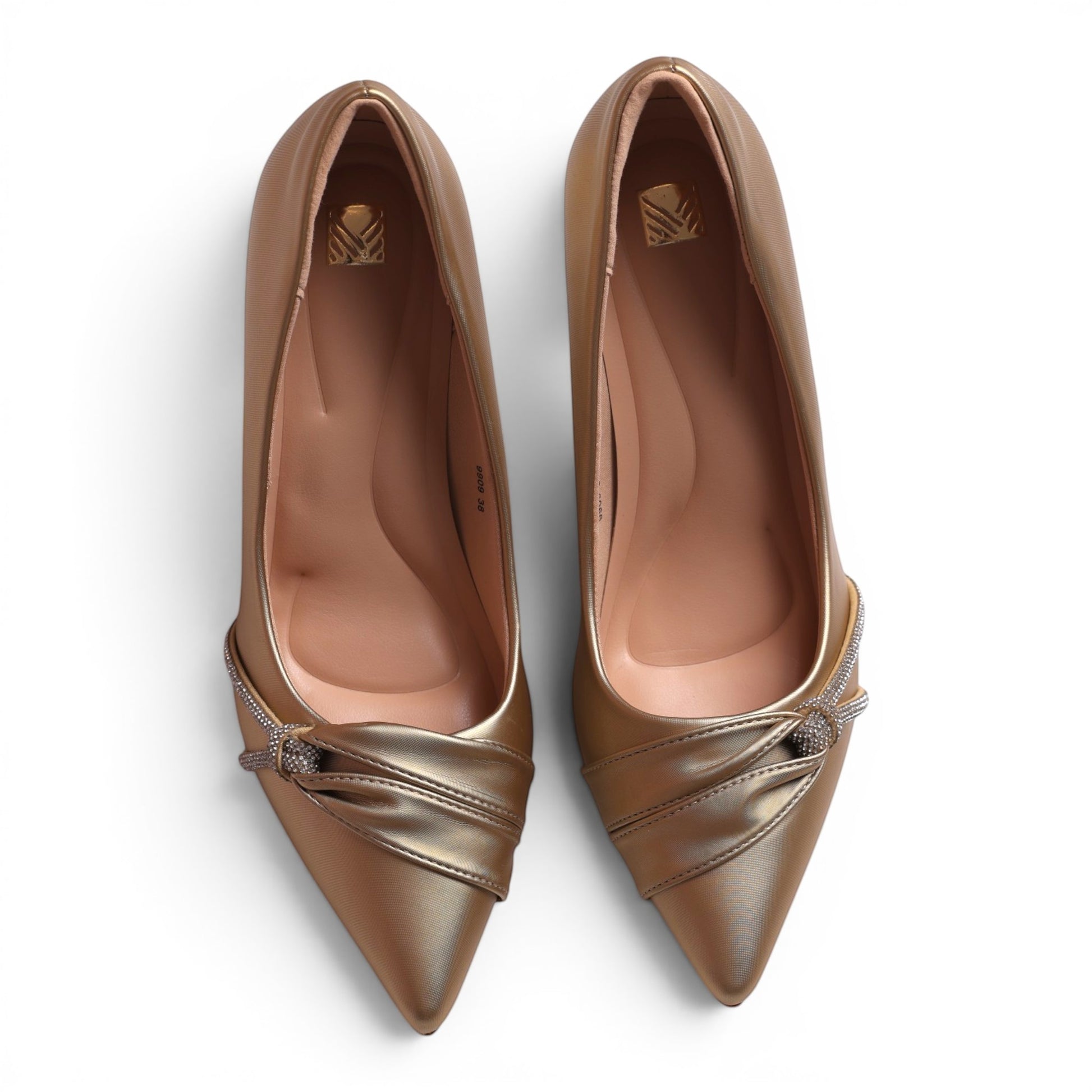 Moda Ug gold metallic pointed-toe pumps with ruched detail and crystal embellishments.