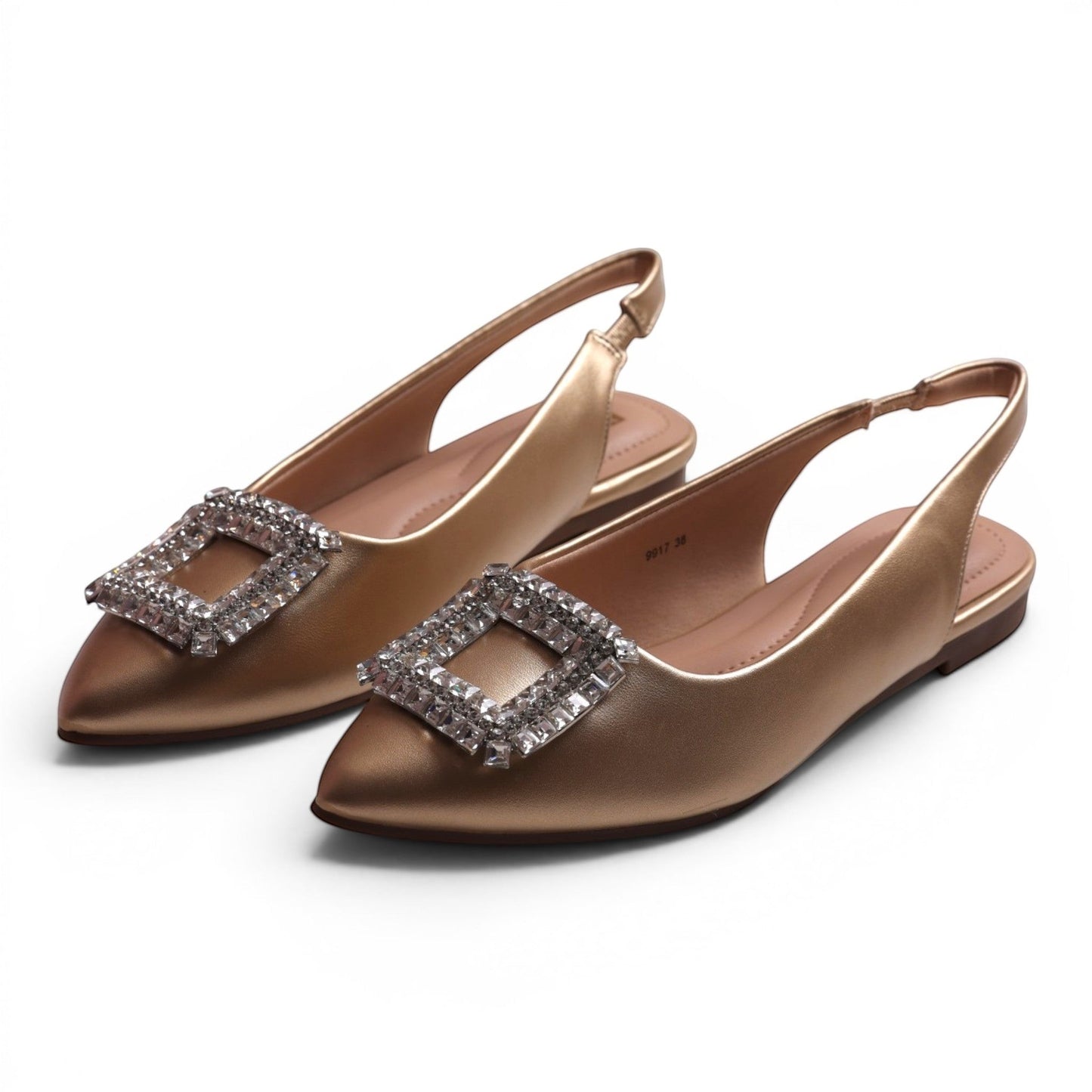 Moda Ug gold slingback flats with square rhinestone buckle detail. Pointed toe, low heel.