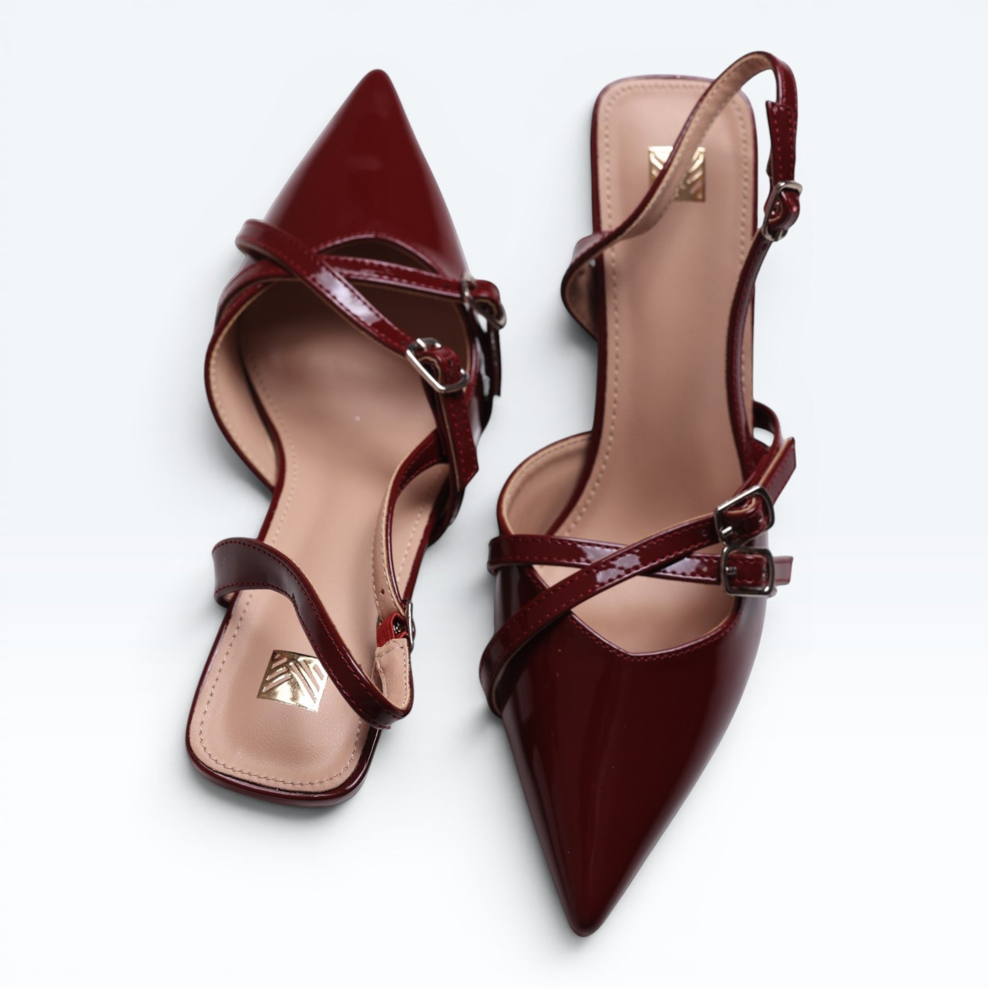 Moda Ug patent wine-red burgundy & black multi-strap slingback heels with pointed toe and silver buckles.