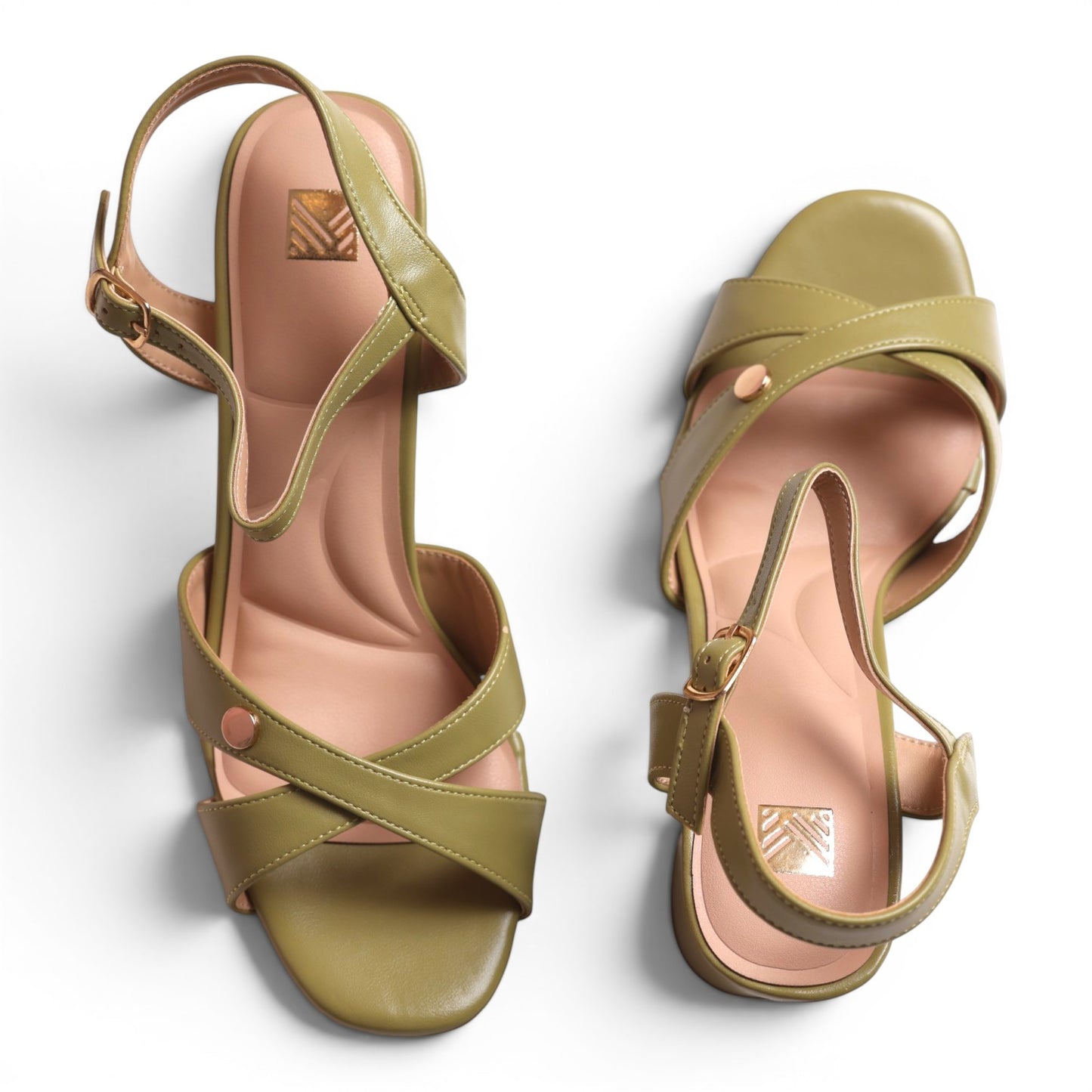 Moda Ug olive green faux leather criss-cross strap sandals with buckle ankle strap and cushioned footbed.