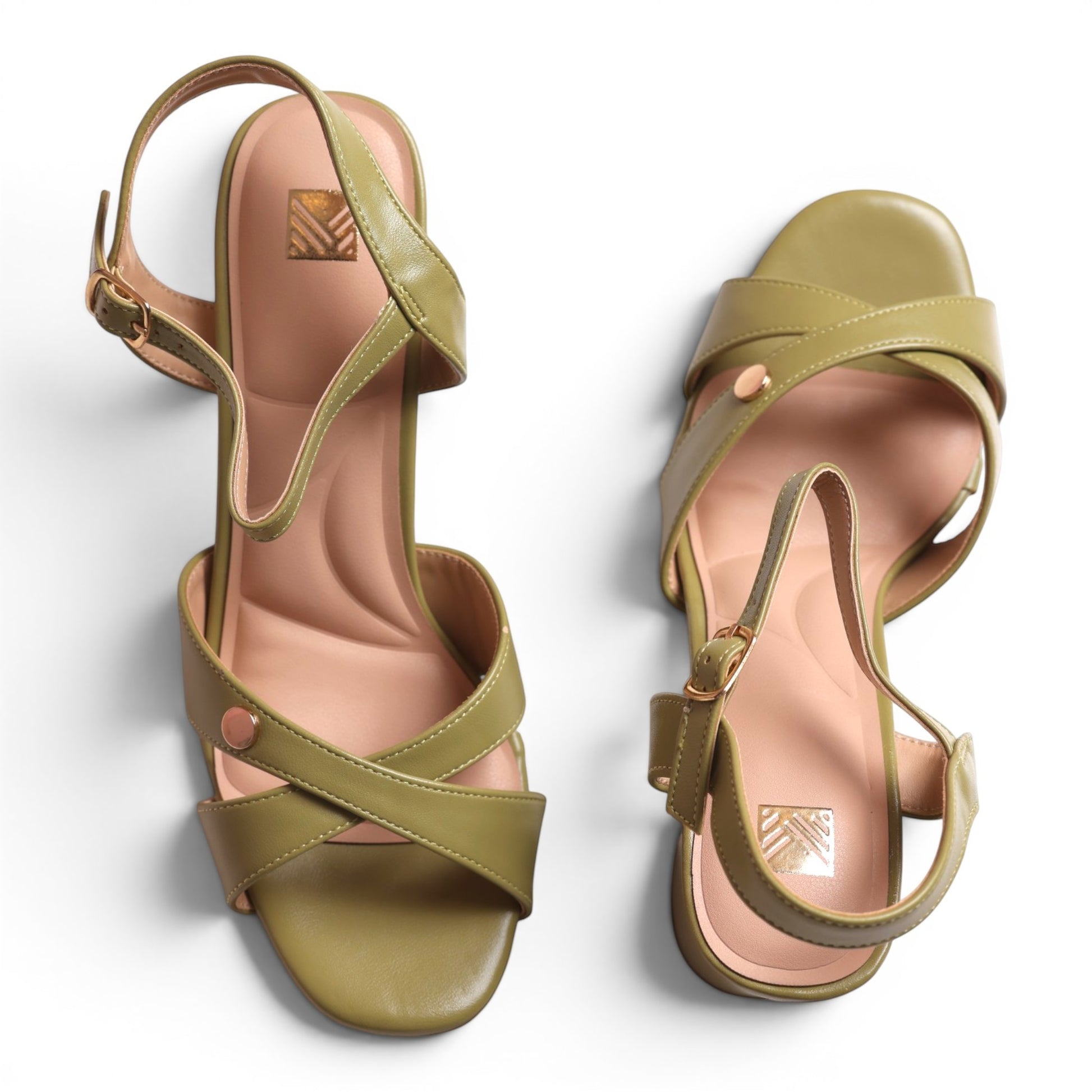 Moda Ug olive green faux leather criss-cross strap sandals with buckle ankle strap and cushioned footbed.