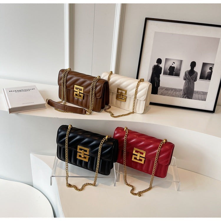 Moda Ug Quilted rhombic chain shoulder bag in black, brown, cream, and red PU leather with gold hardware.