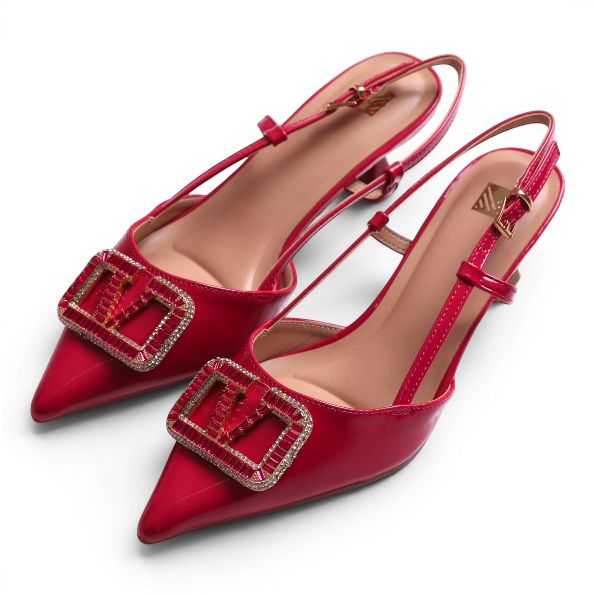 Moda Ug red patent leather slingback heels with crystal embellishments and pointed toe.