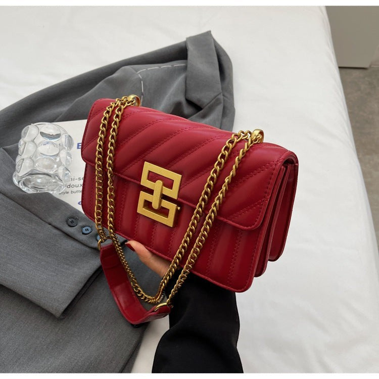Moda Ug red PU leather small square crossbody handbag with quilted rhombic pattern and gold chain strap.
