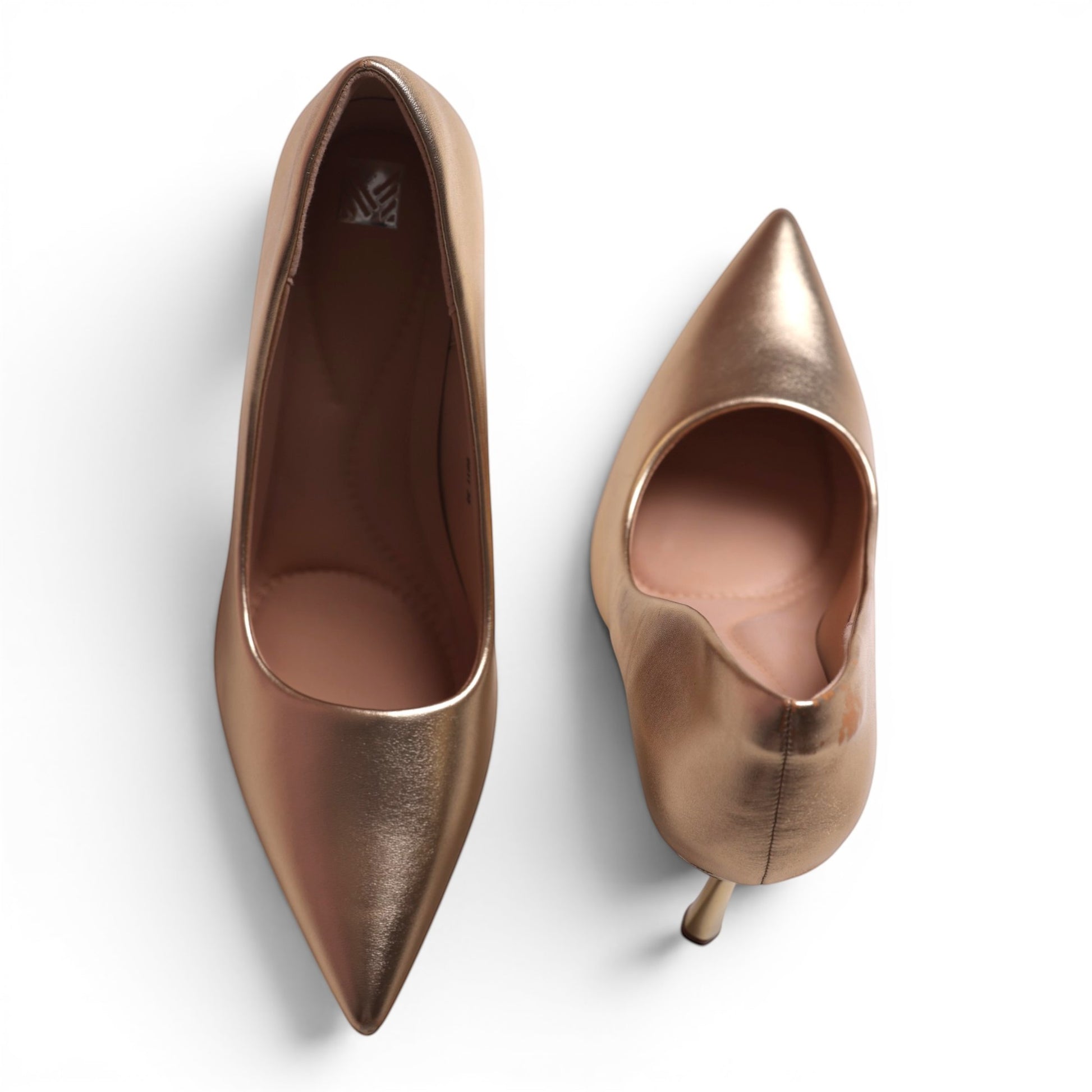 Moda Ug women's rose gold pointed-toe stiletto heels with a metallic finish.