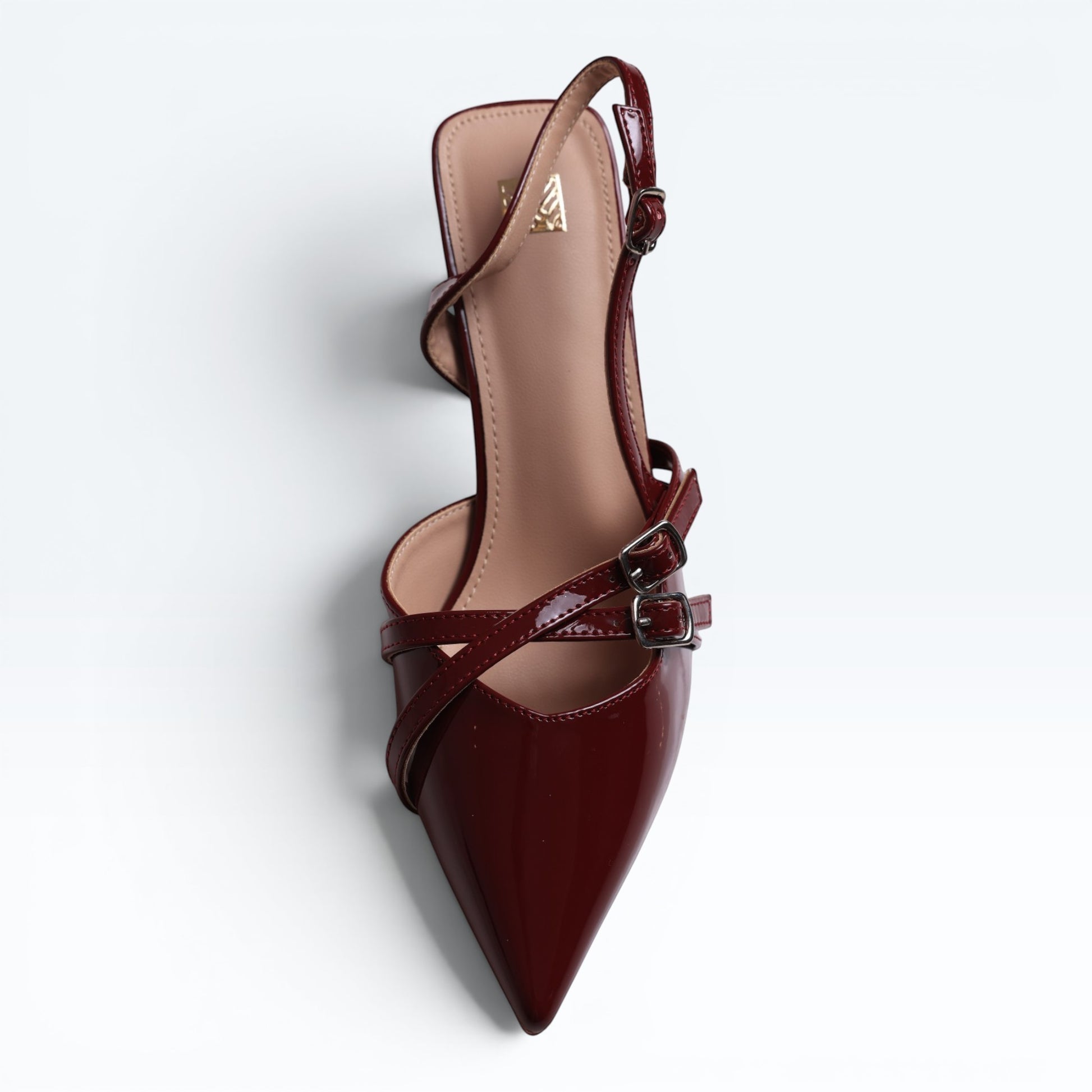 Moda Ug patent wine-red burgundy & black multi-strap slingback heels with pointed toe & silver buckles.
