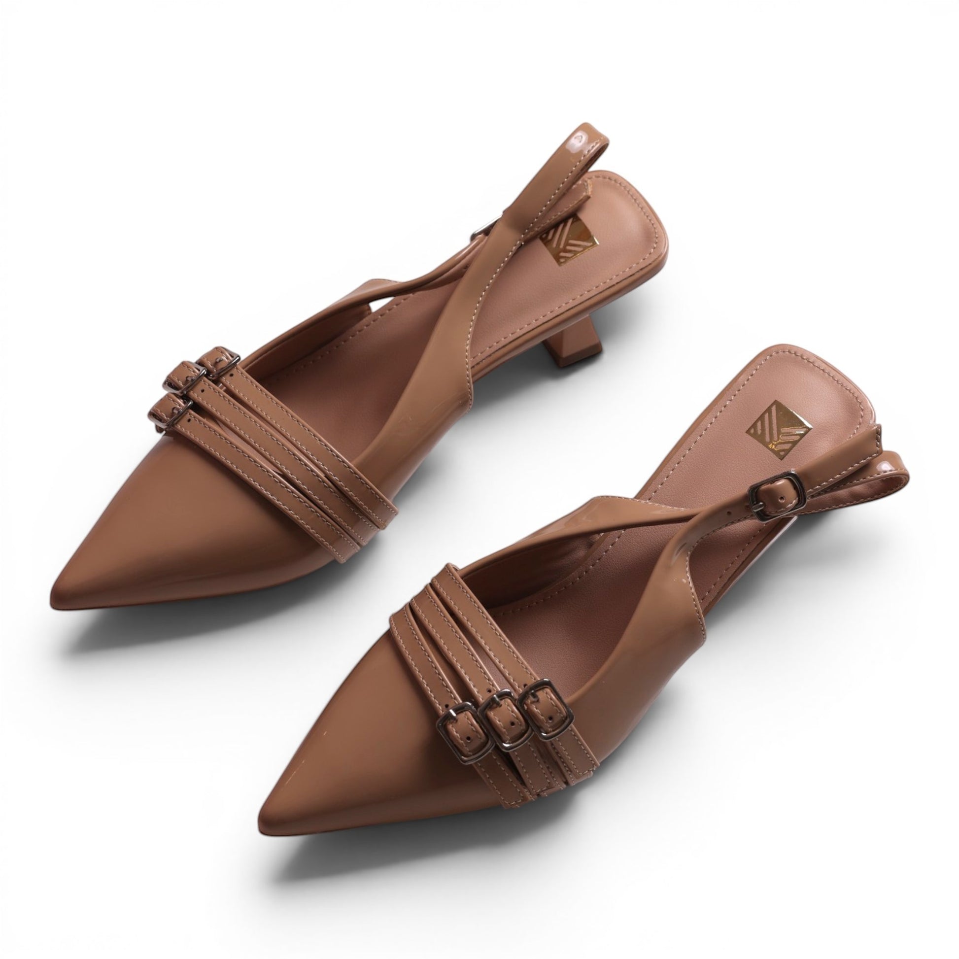Moda Ug women's tan patent leather slingback kitten heel dress shoes with pointed toe and triple buckle straps.