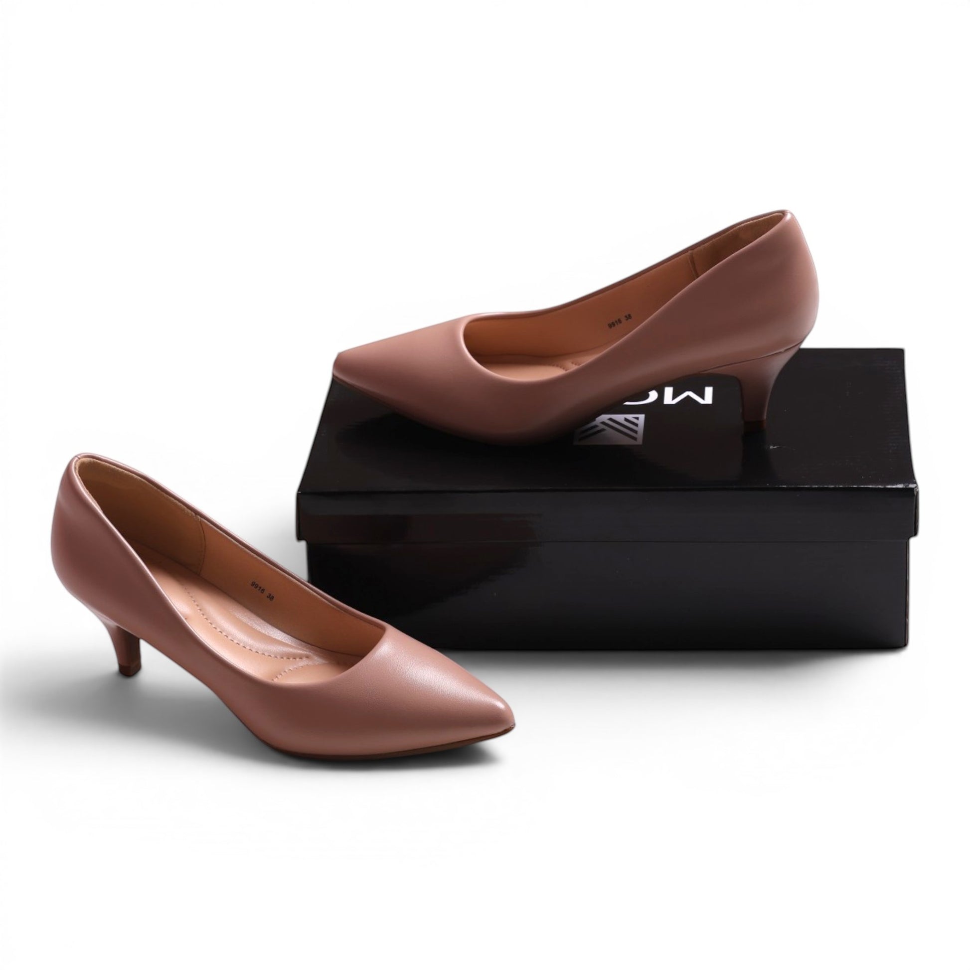 Moda Ug taupe leather pointed-toe kitten heel pumps with a low heel.