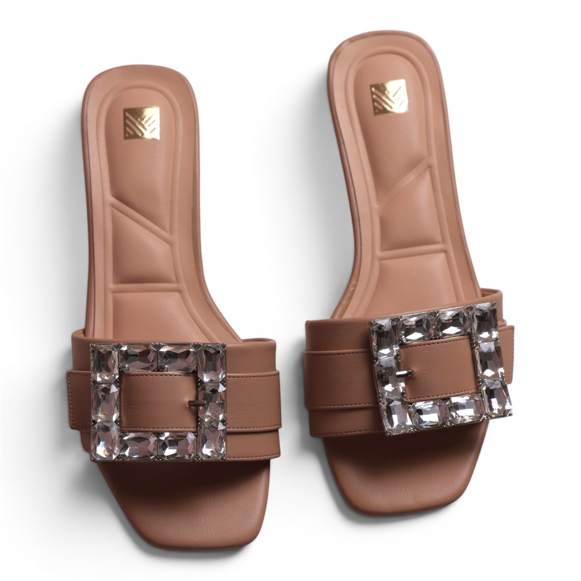 Moda Ug taupe leather slide sandals with large crystal-embellished square buckles.