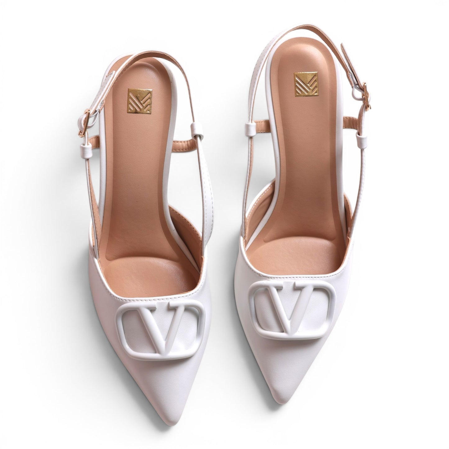 Moda Ug white leather slingback heels with pointed toe and V logo detail. Adjustable ankle strap.