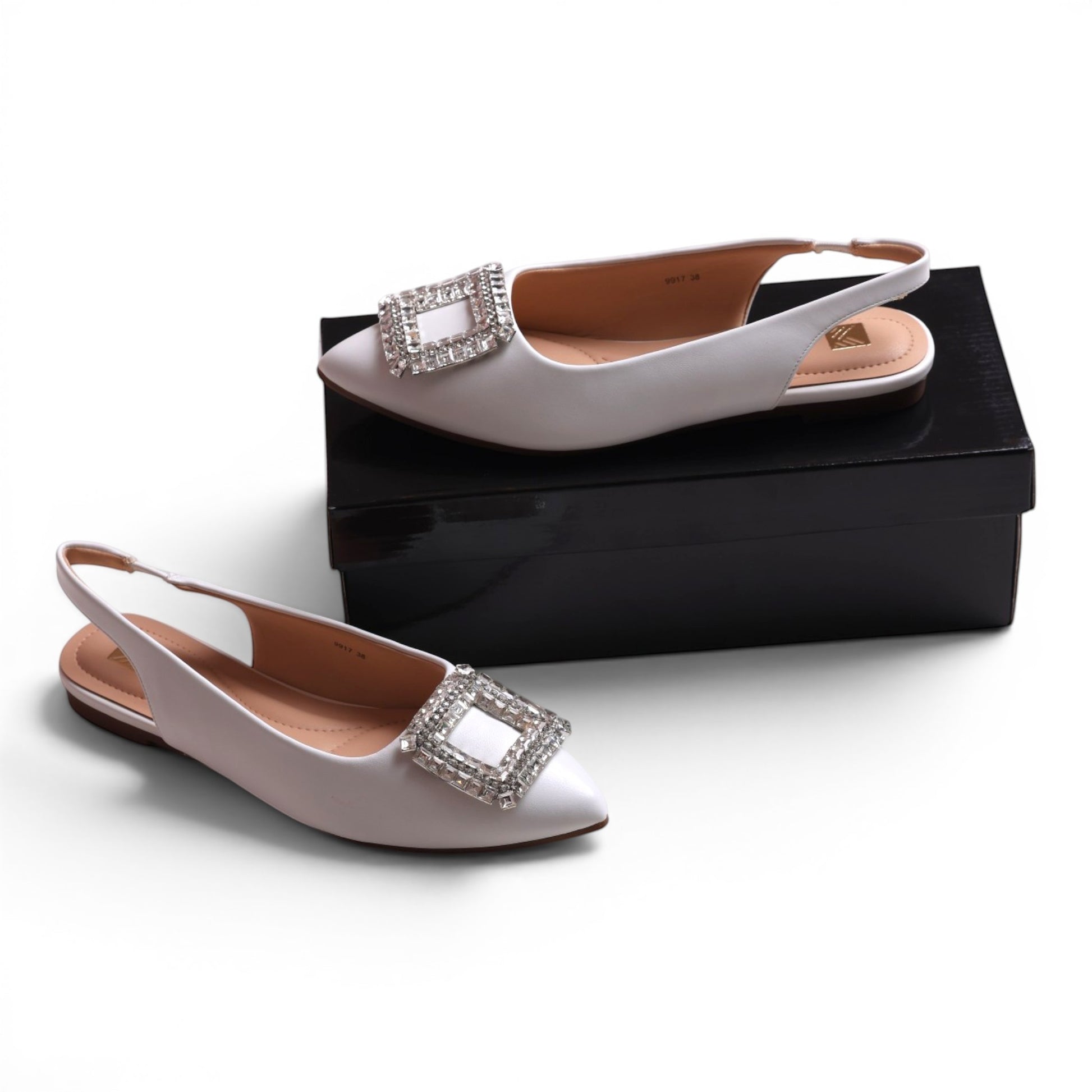 Moda Ug white satin-like pointed toe slingback flats with crystal square buckle detail.