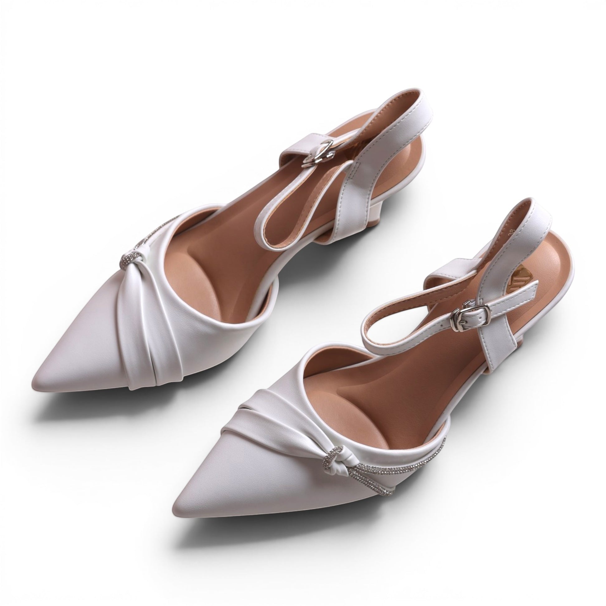 Moda Ug white pointed-toe slingback flats with ruched detail and crystal embellishments.
