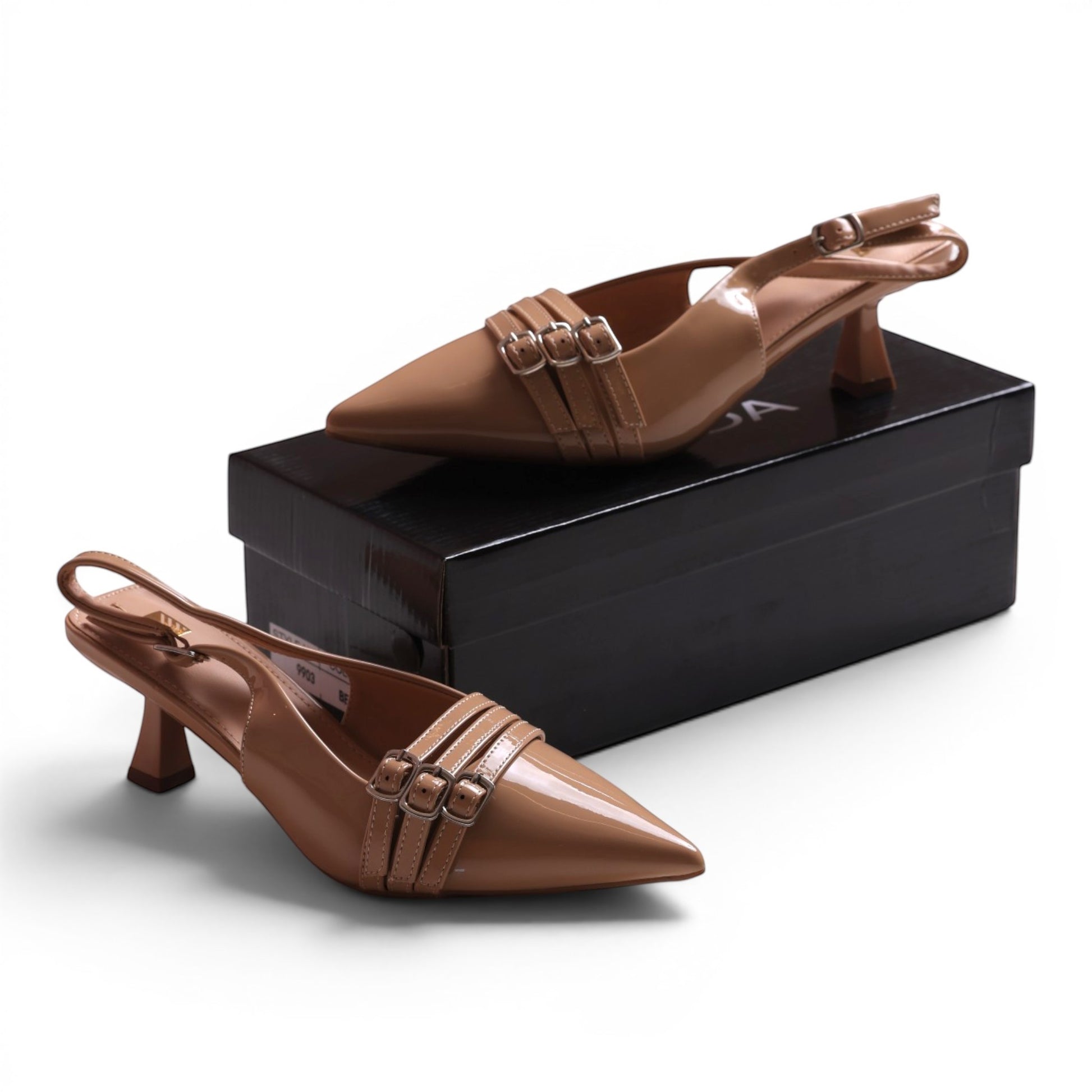 Moda Ug Women's patent leather slingback kitten heel dress shoes in tan with pointed toe and triple buckle straps.