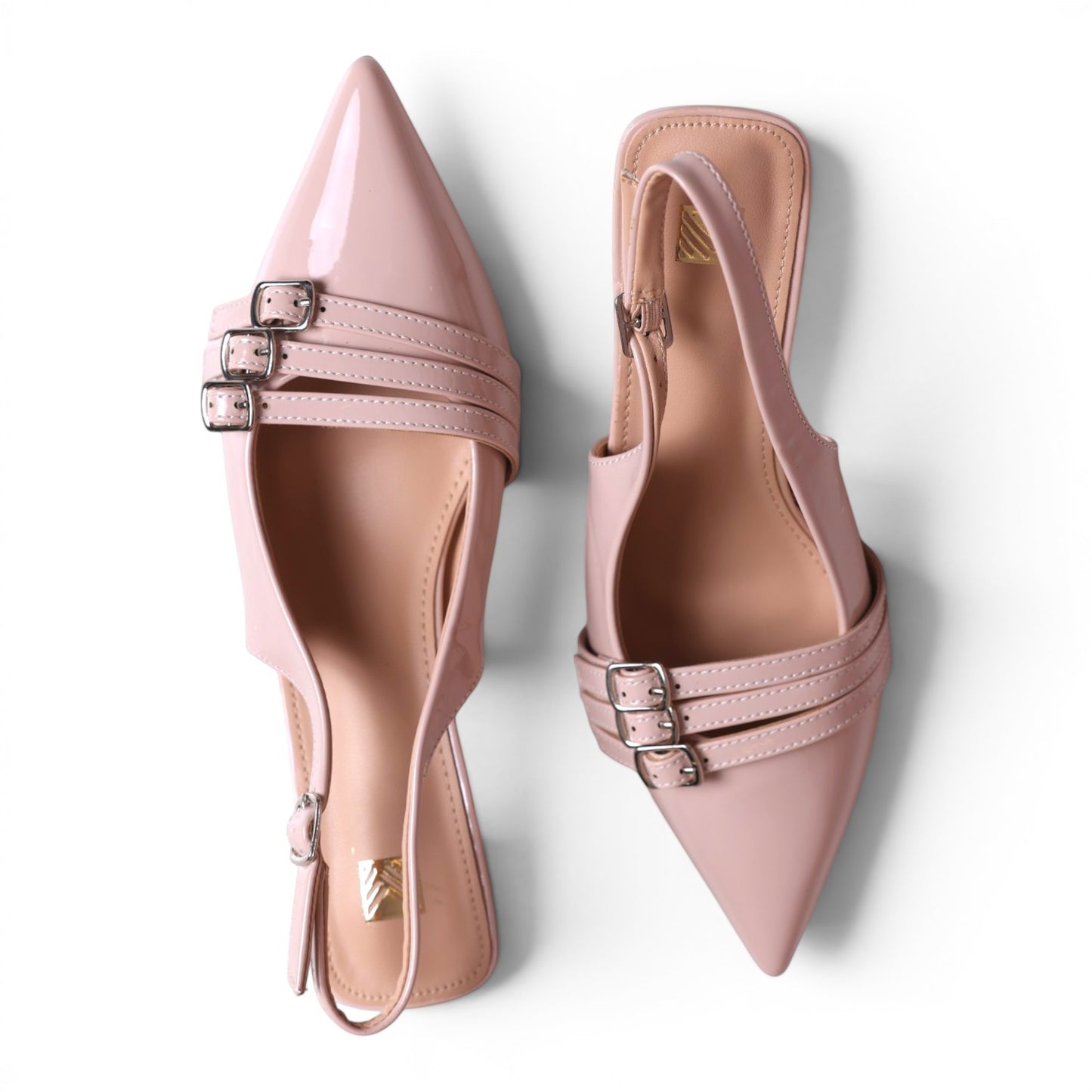 Moda Ug women's blush pink patent slingback kitten heel dress shoes with pointed toe and triple buckle straps.