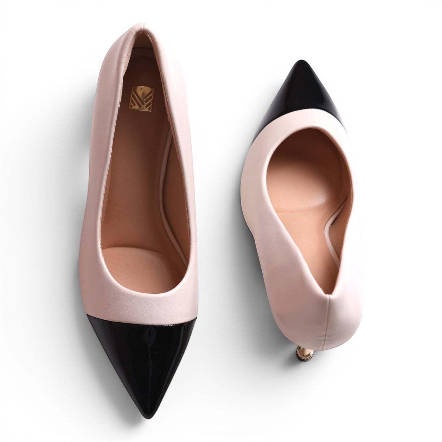 Moda Ugo women's two-tone pointed-toe pumps in blush pink with black patent leather cap toe.